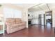 Cozy living room with a comfortable couch and view into the kitchen at 315 30Th W Ave # B201, Bradenton, FL 34205