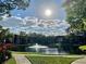 Peaceful pond with a fountain in the community at 315 30Th W Ave # B201, Bradenton, FL 34205