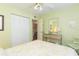 Bedroom with a queen bed, built-in closet and dresser at 315 30Th W Ave # B201, Bradenton, FL 34205