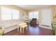 Spacious living room with hardwood floors, ample natural light, and comfortable seating at 315 30Th W Ave # B201, Bradenton, FL 34205
