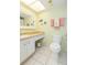 Clean bathroom with a single sink vanity and shower at 315 30Th W Ave # B201, Bradenton, FL 34205