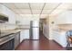 Clean kitchen, featuring stainless steel appliances and white cabinetry at 315 30Th W Ave # B201, Bradenton, FL 34205
