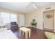 Living room with hardwood floors, neutral color palette, and access to other rooms at 315 30Th W Ave # B201, Bradenton, FL 34205