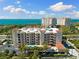 Condo building with pool and bay views at 1188 N Tamiami Trl # 201, Sarasota, FL 34236