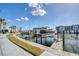 Community dock with boat slips and water access at 179 Medallion Blvd # C, Madeira Beach, FL 33708