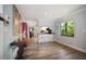 View down hallway showcasing kitchen and access to other rooms at 1820 1/2 N Washington Ave, Clearwater, FL 33755