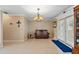 Bright living room with tiled floors and French doors at 3887 50Th S Ave, St Petersburg, FL 33711