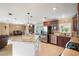 Open concept kitchen with island and breakfast bar at 3887 50Th S Ave, St Petersburg, FL 33711