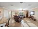 Bright living room with comfortable seating and large TV at 3887 50Th S Ave, St Petersburg, FL 33711