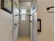 Updated shower with tiled walls and built-in seat at 3887 50Th S Ave, St Petersburg, FL 33711