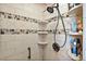 Corner shower with tiled walls and multiple shelves at 3887 50Th S Ave, St Petersburg, FL 33711