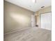 Bedroom with neutral carpet and paint, and closet with bi-fold doors at 10108 Courtney Oaks Cir # 203, Tampa, FL 33619