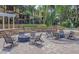 Community fire pit with modern chairs at 10108 Courtney Oaks Cir # 203, Tampa, FL 33619