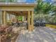 Community patio with tables, chairs, and grills at 10108 Courtney Oaks Cir # 203, Tampa, FL 33619