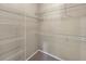 Walk-in closet with wire shelving and carpet flooring at 10108 Courtney Oaks Cir # 203, Tampa, FL 33619