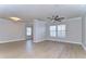 Spacious living room with hardwood floors and lots of natural light at 18163 Bridle Club Dr # 18163, Tampa, FL 33647