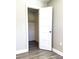 Walk-in closet with wood-look floors and shelving at 220 N Bayshore Blvd # 108, Clearwater, FL 33759