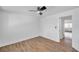 Bright bedroom with ceiling fan and view of another room at 2353 Shelley St # 16, Clearwater, FL 33765