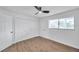 Spacious bedroom with large closet and ceiling fan at 2353 Shelley St # 16, Clearwater, FL 33765