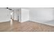 Bright living room featuring wood-look tile floors and ceiling fan at 2353 Shelley St # 16, Clearwater, FL 33765