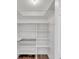 Spacious white pantry with ample shelving for storage at 2353 Shelley St # 16, Clearwater, FL 33765