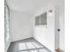 Bright sunroom with windows and gray flooring at 2353 Shelley St # 16, Clearwater, FL 33765