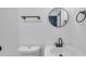 Clean bathroom with white vanity and black matte fixtures at 2353 Shelley St # 4, Clearwater, FL 33765