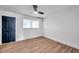Spacious bedroom with ceiling fan and wood-look flooring at 2353 Shelley St # 4, Clearwater, FL 33765
