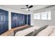 Bright bedroom with walk in closet and wood-look flooring at 2353 Shelley St # 4, Clearwater, FL 33765