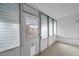 Enclosed patio with window louvers and exterior access at 2353 Shelley St # 4, Clearwater, FL 33765