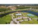 Aerial view of community pool, tennis, and playground at 5085 Ivory Stone Dr, Wimauma, FL 33598