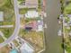 Aerial view of waterfront home with private dock and spacious lot at 5092 Cedarbrook Ln, Hernando Beach, FL 34607