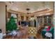 Spacious living room with hardwood floors and a built-in entertainment center at 531 Isleworth Close, Tarpon Springs, FL 34688