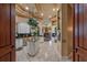 Large kitchen with granite countertops, white cabinets, and stainless steel appliances at 531 Isleworth Close, Tarpon Springs, FL 34688