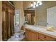 Elegant bathroom with a vanity, toilet and shower at 531 Isleworth Close, Tarpon Springs, FL 34688
