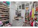 Large walk-in closet with ample shelving and storage at 531 Isleworth Close, Tarpon Springs, FL 34688