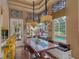 Bright breakfast nook with built-in bench seating and pool view at 531 Isleworth Close, Tarpon Springs, FL 34688