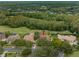 Bird's-eye view of a home on a golf course at 531 Isleworth Close, Tarpon Springs, FL 34688