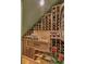 Unique, tiered wine cellar with additional storage drawer at 531 Isleworth Close, Tarpon Springs, FL 34688