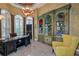 Bright home office with built-in bookcases and hardwood floors at 531 Isleworth Close, Tarpon Springs, FL 34688