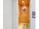 Private elevator with wood paneling and artwork at 838 Monterey Ne Blvd, St Petersburg, FL 33704