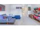 bedroom with twin bed, rocking chair, and built-in shelving at 838 Monterey Ne Blvd, St Petersburg, FL 33704