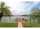 Private wooden dock offering waterfront access and scenic views at 905 Oakwood Dr, Largo, FL 33770