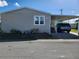 Single-wide manufactured home with carport at 918 50Th W Ave, Bradenton, FL 34207