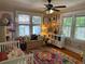 ' playroom with colorful rug, toys, and built-in shelving at 1435 29Th N Ave, St Petersburg, FL 33704