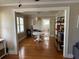 Dining room with hardwood floors, a table and built-in shelving at 1435 29Th N Ave, St Petersburg, FL 33704