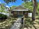 Charming bungalow with a brick facade and landscaped yard at 1435 29Th N Ave, St Petersburg, FL 33704