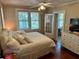 Spacious bedroom with king-size bed and access to a patio at 1435 29Th N Ave, St Petersburg, FL 33704