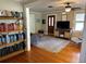 Living room with hardwood floors, a fireplace and built-in shelving at 1435 29Th N Ave, St Petersburg, FL 33704