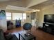 Finished basement with laundry, TV and seating area at 1435 29Th N Ave, St Petersburg, FL 33704